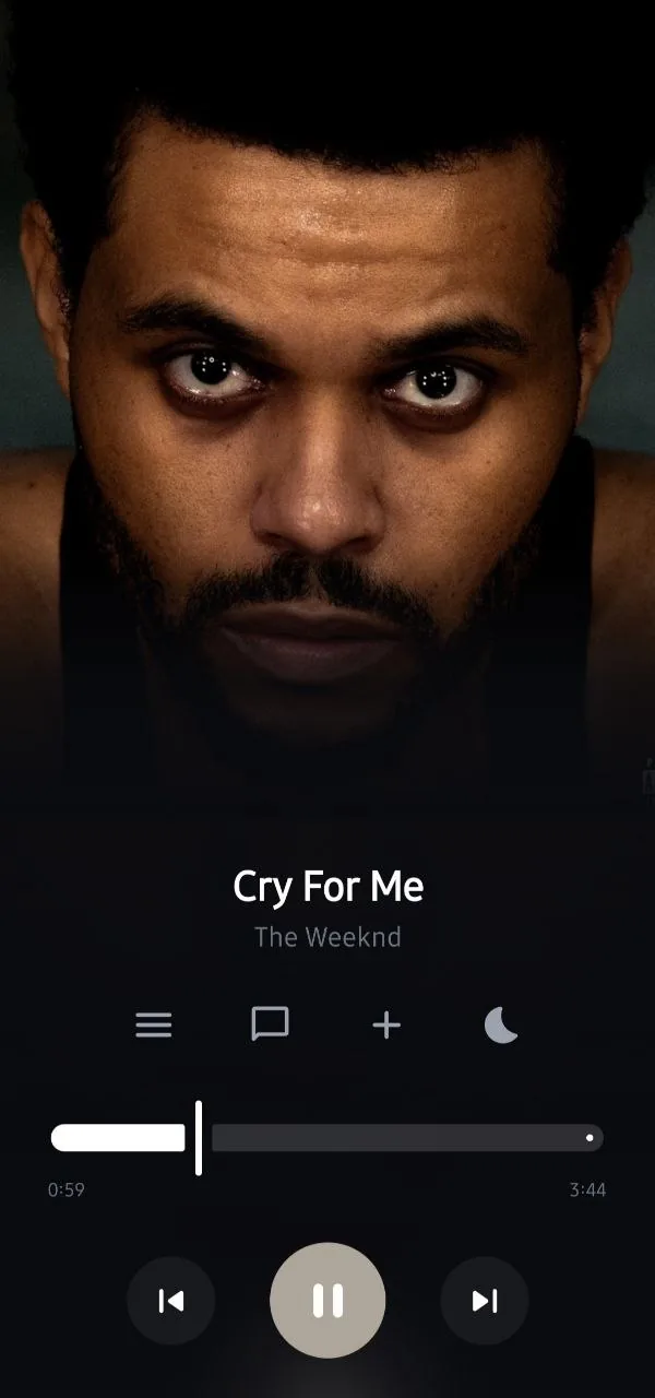 Obsidian Music player screen with full-screen album artwork and playback controls